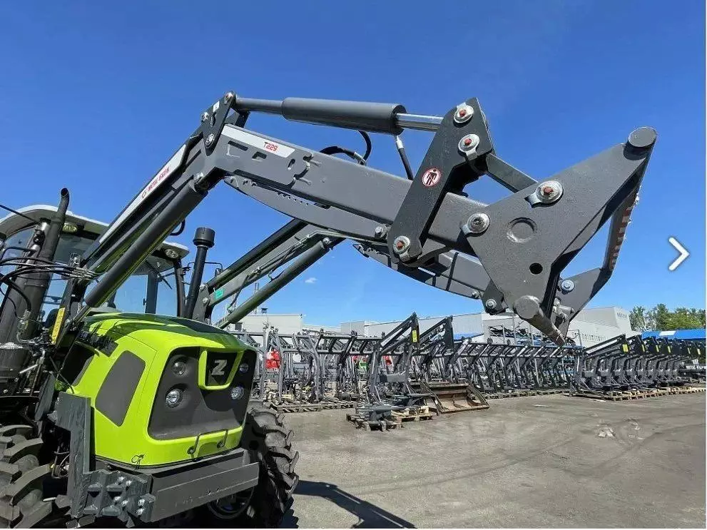 Zoomlion RN904 с ковшовым навесным оборудованием Metal Fach Бык T-229 S